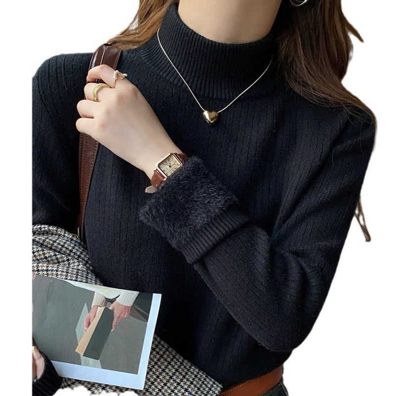 Pull femme avec col roulé et ourlet moelleux luxueux Chic & Stil