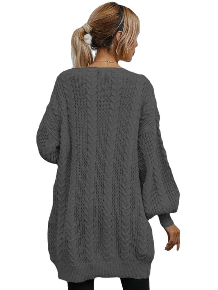 Thick knitted cardigan for women with a relaxed oversized fit and a refined cable pattern Lune London