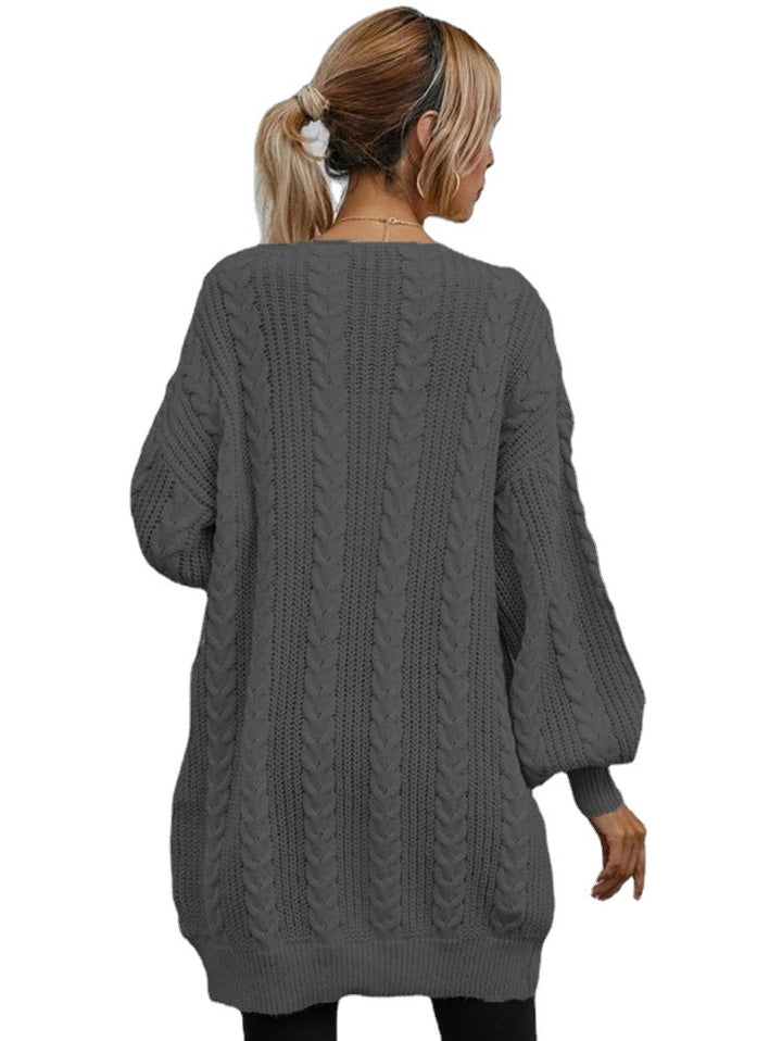 Thick knitted cardigan for women with a relaxed oversized fit and a refined cable pattern Lune London