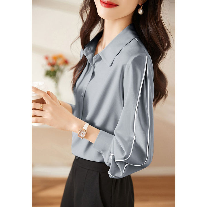 Blouse élégante pour femmes avec détails de boutons classiques Chic & Stil