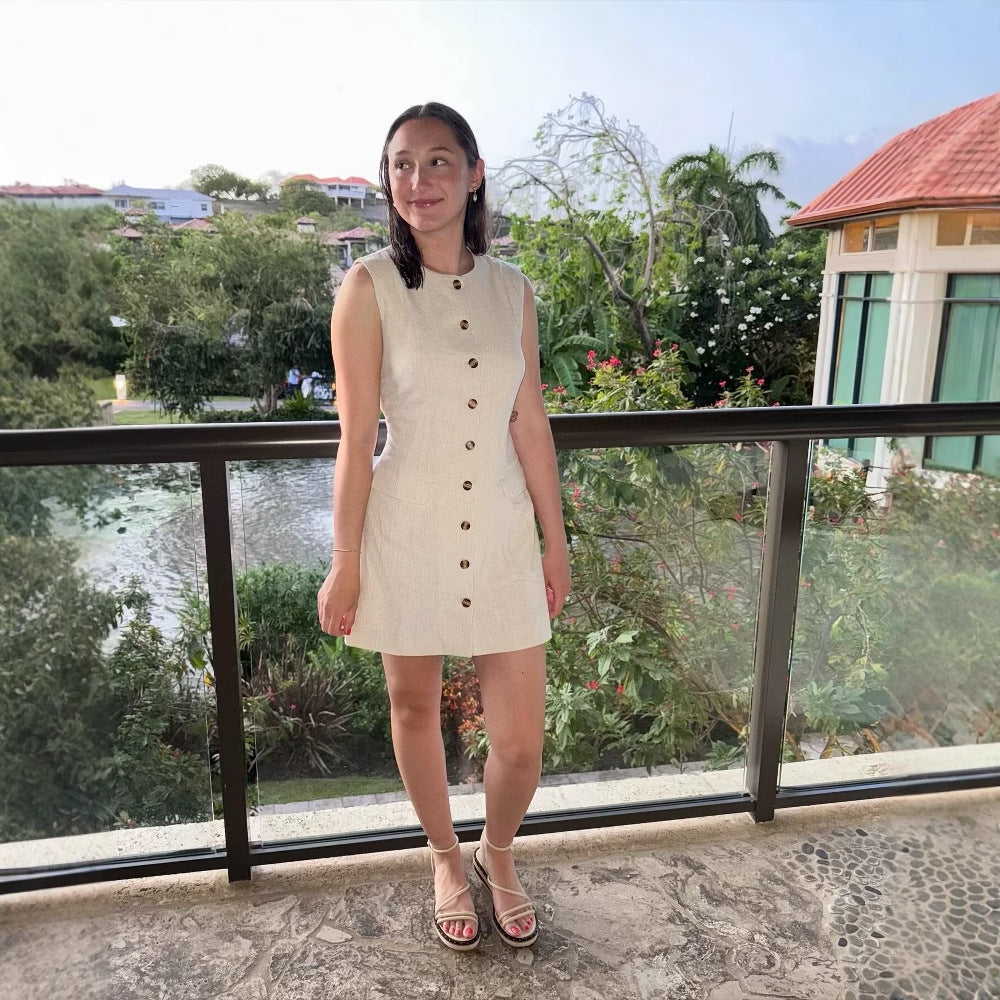 Sleeveless shirt dress for women with practical pockets and decorative button details Lune London