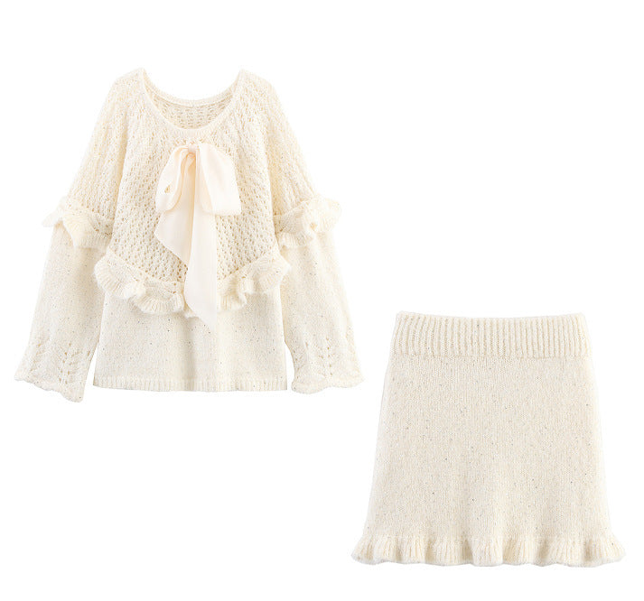 Elegant ladies knitted outfit with ruffles and bow accents Lune London