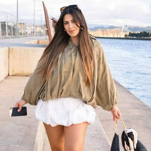 Oversized blouse for women with refined draping and an elegant button detail Lune London