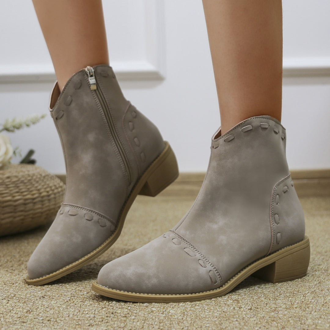 Elegant ankle boots for women with trendy decorative stitching and a practical zipper Lune London