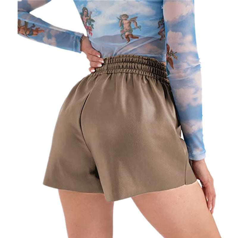 Casual women's shorts in innovative synthetic leather with an elastic waistband and practical button details Lune London