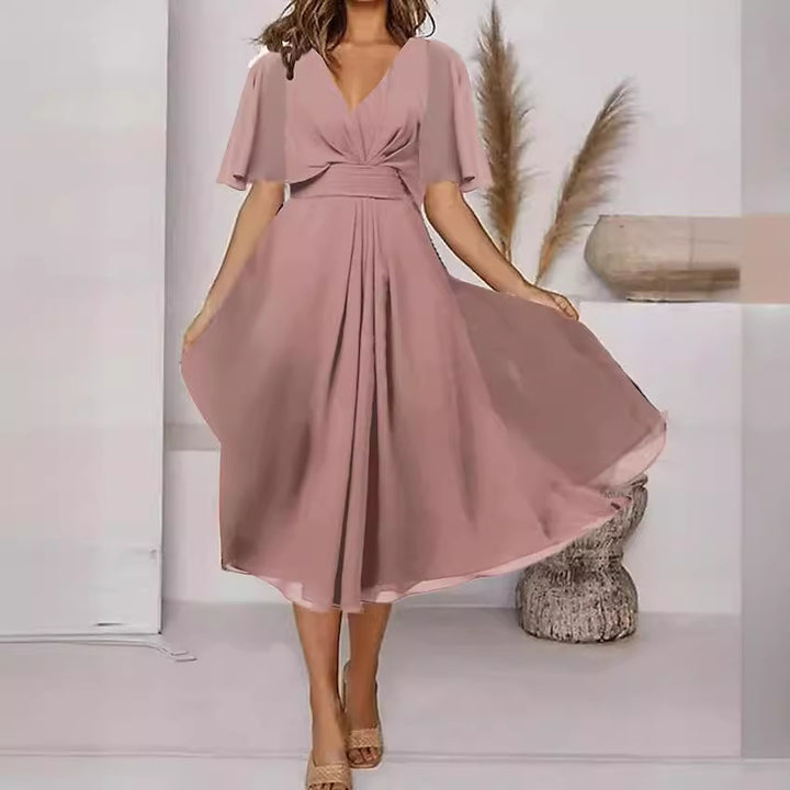 Elegant maxi dress for women with flowing sleeves and a chic V-neck.