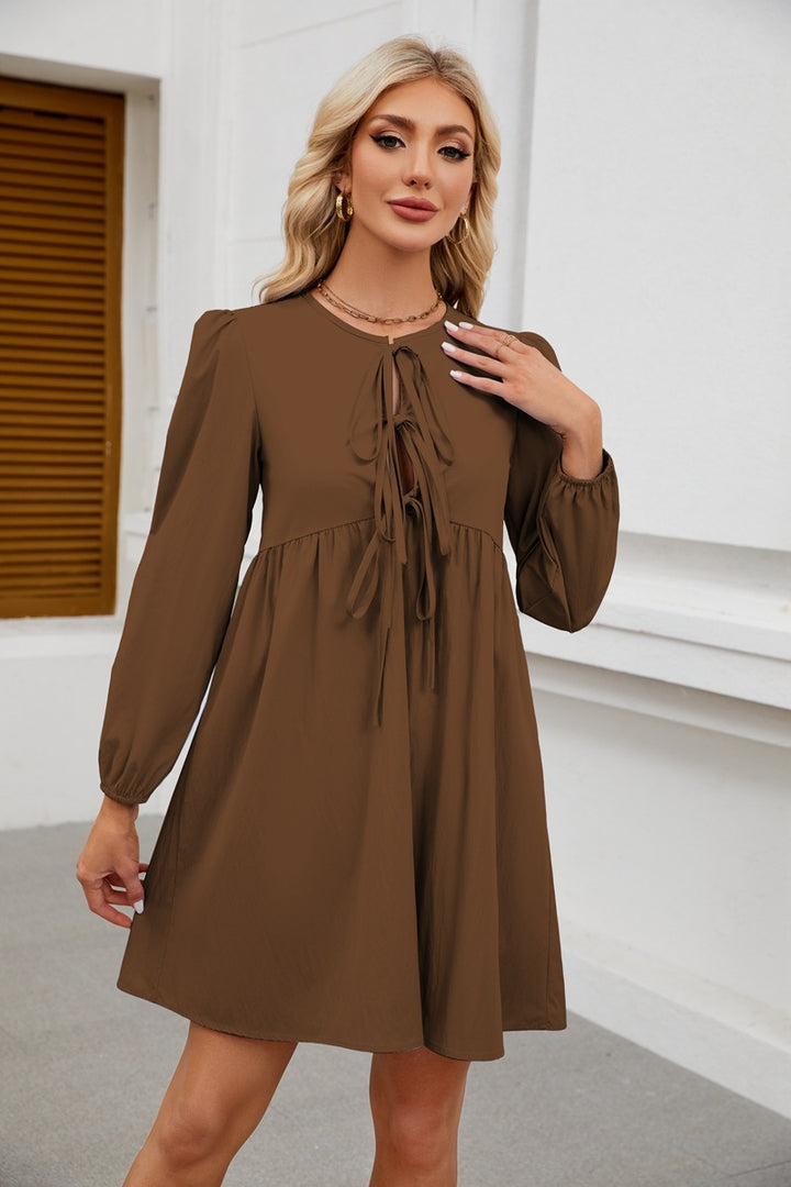 Fitted dress for women with knot opening and balloon sleeves Lune London