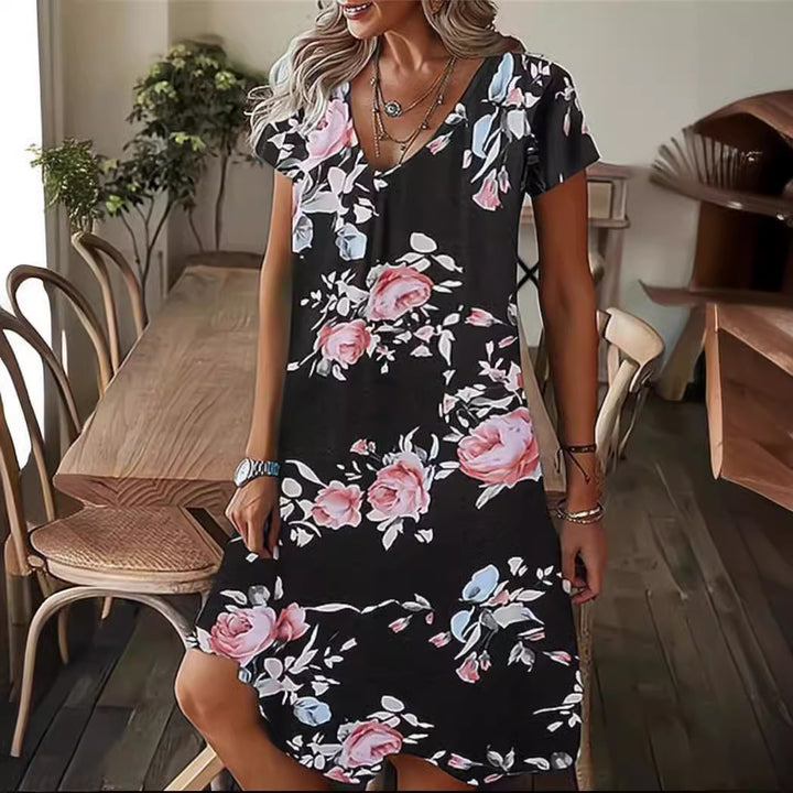 Fluid V-neck midi dress for women with abstract pattern Lune London