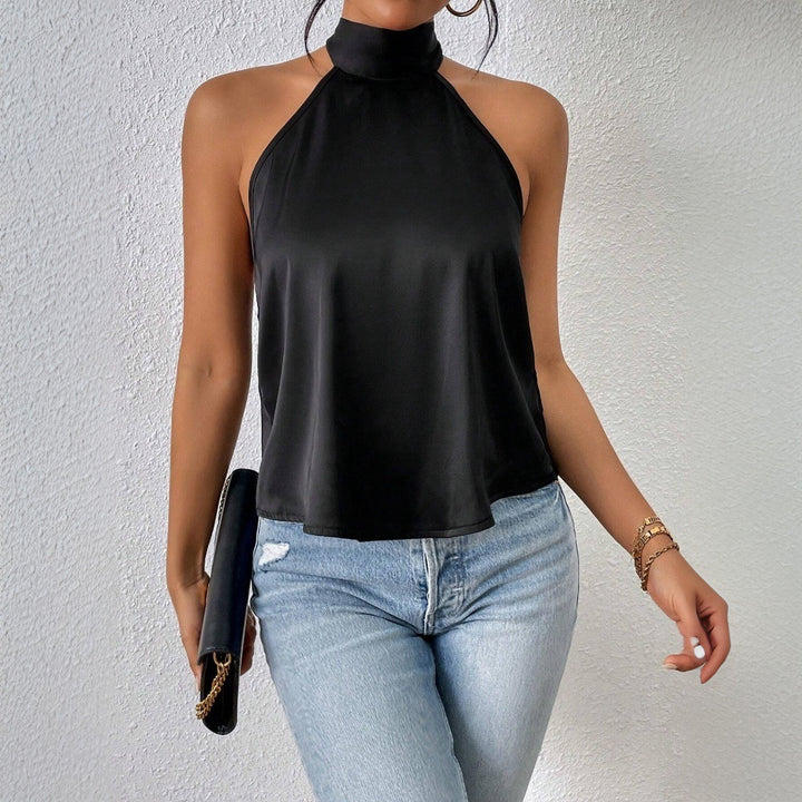 Elegant women's top with backless design and silky finish Chic & Stil