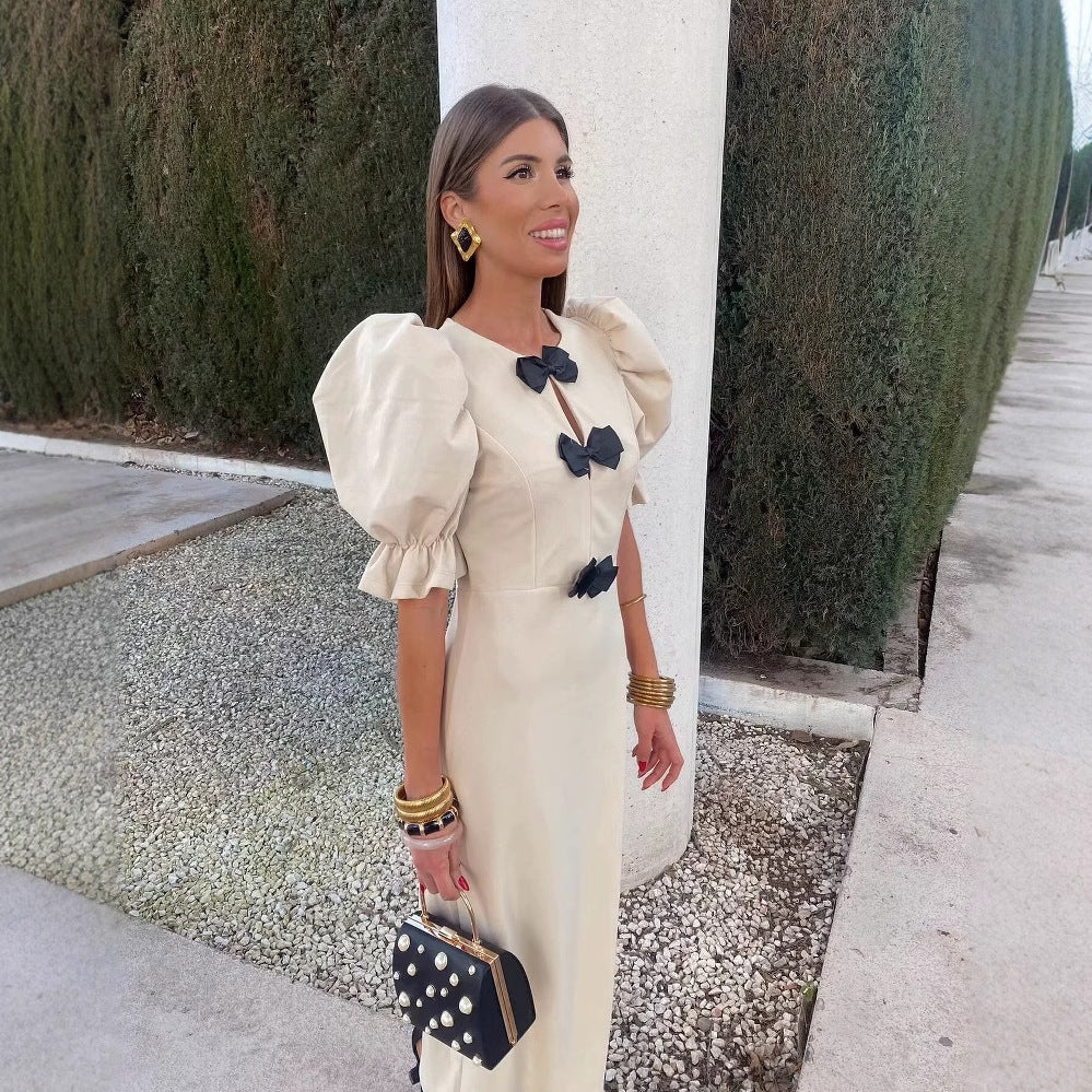 Ladies Elegant Maxi Dress with Unique Bow Detail and Puff Sleeve Design Lune London