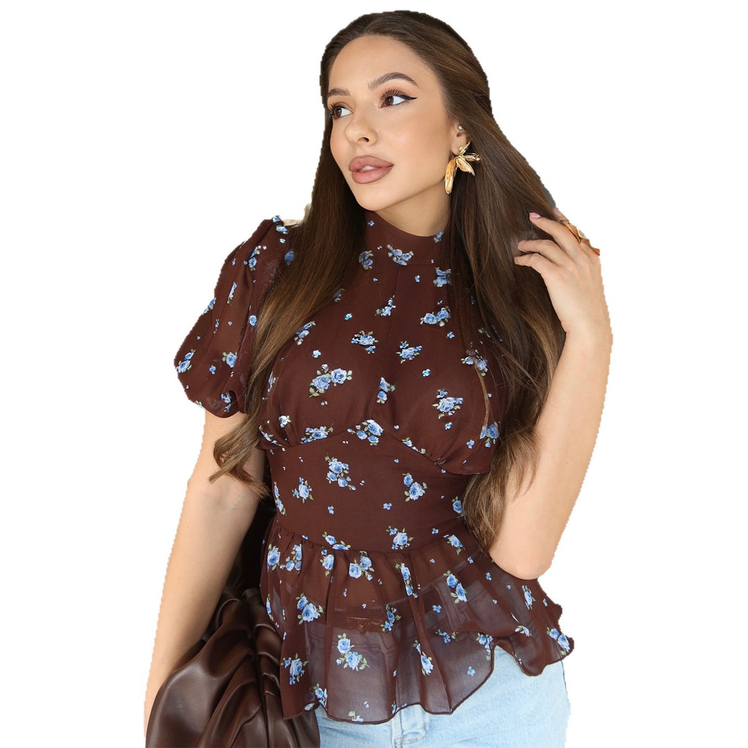 Women’s blouse with floral design and ruffle hem Lune London