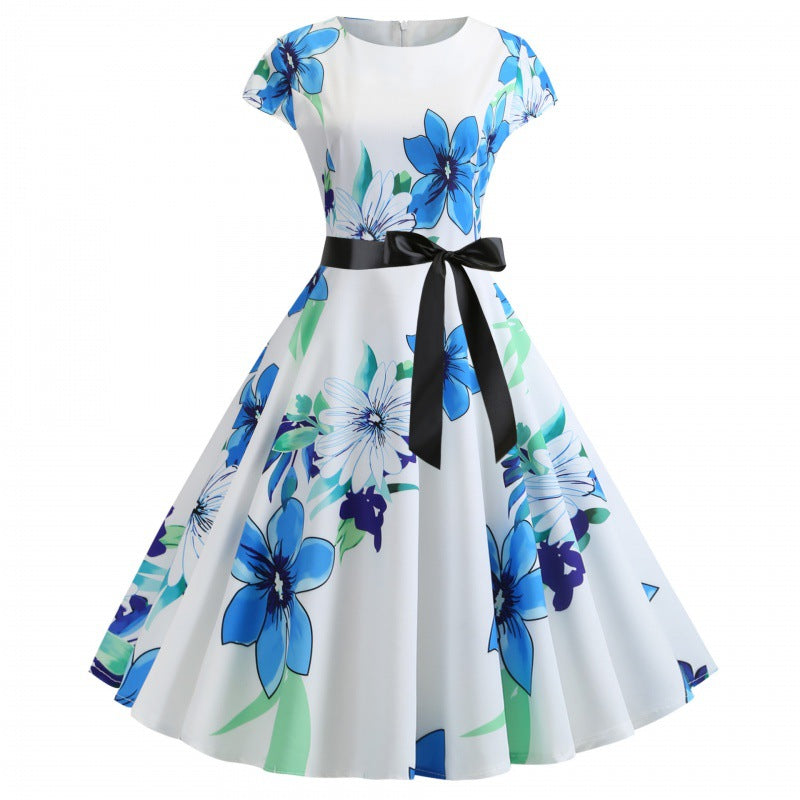 Robe swing femme avec des motifs floraux et une ceinture élégante Chic & Stil