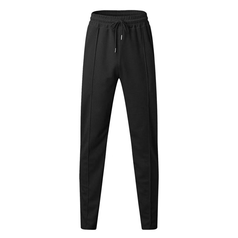 Sports jogger pants for men with elastic waistband and zip pockets Lune London