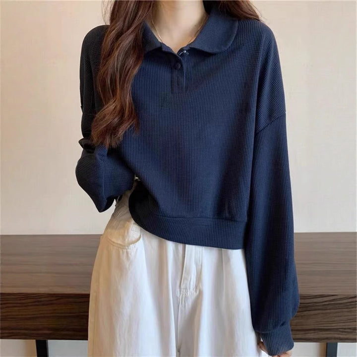 Pull polo décontracté pour femmes avec détails de boutons Chic & Stil