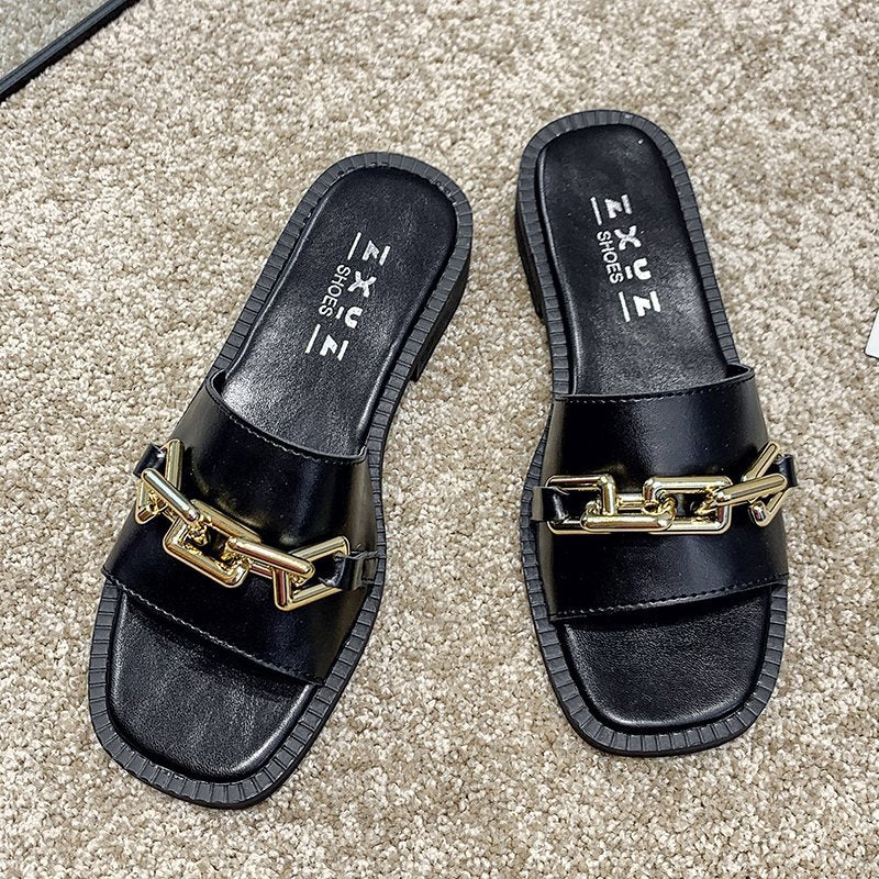 Dear elegant slippers with decorative chain accessory Lune London