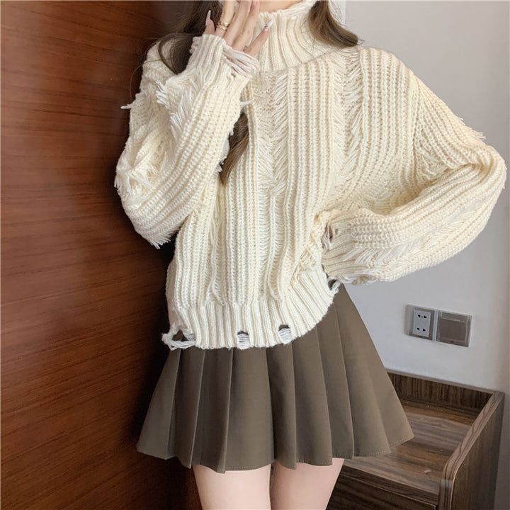 Pull en tricot épais pour femmes avec col montant et franges modernes Chic & Stil