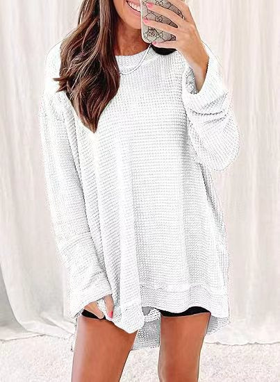 Waffle knit long sleeve sweater for women with open cut and side slits Lune London