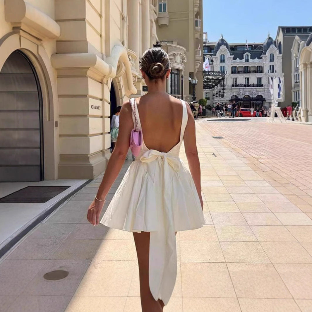 Women Playfully Cut Mini Dress with Square Neckline and Flared Skirt Lune London
