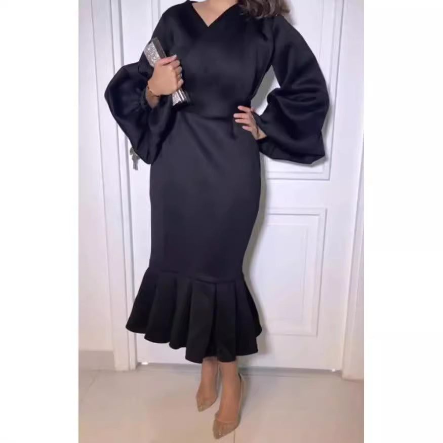 Fitted dress for women with voluminous sleeves and a flowing hem Lune London