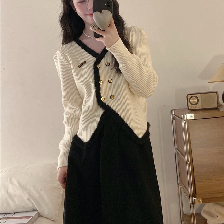 Cardigan élégant pour femmes avec un ourlet contrastant et des détails de boutons Chic & Stil