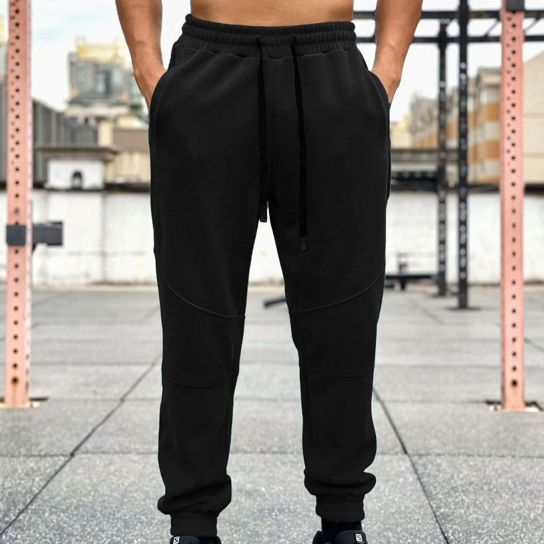 Men's sporty jogging pants with elastic waistband and practical side pockets Lune London