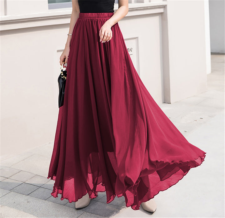 Long and flowing skirt for women with elastic waist and floating hem Lune London