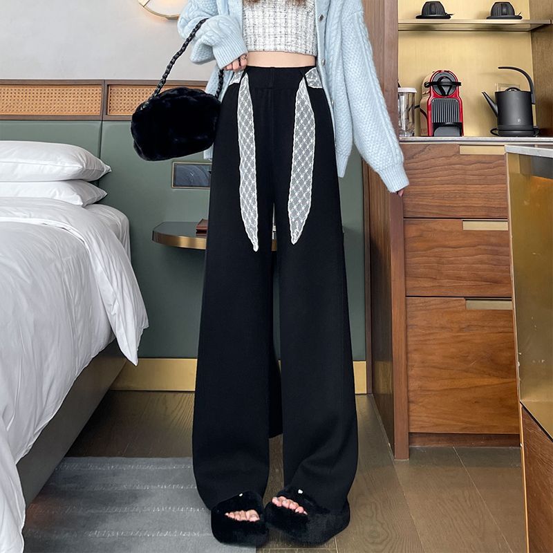 Pantalons larges taille haute pour femmes avec des détails de laçage décoratifs Chic & Stil