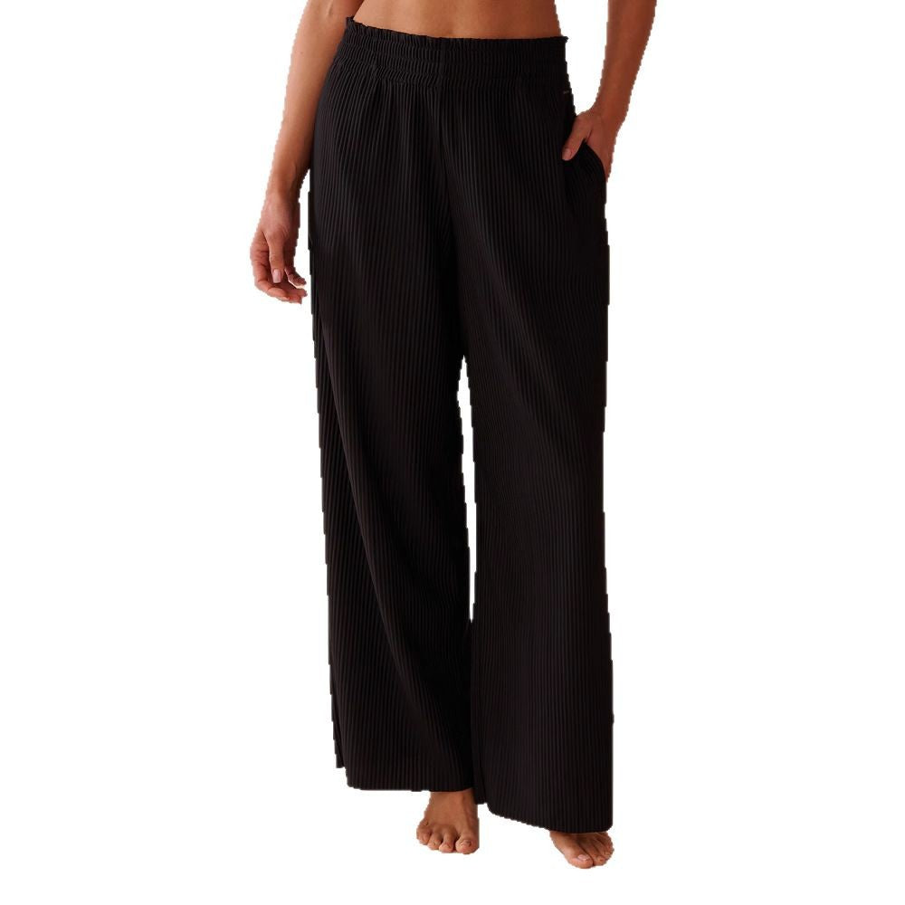 Wide pleated pants for women with elastic waistband and side pockets Lune London