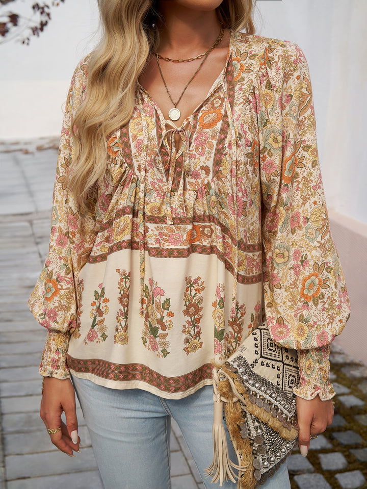 Blouse for women with floral patterns and tie neckline Lune London