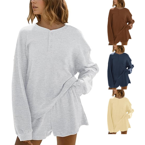 Dames loisirs t-shirt à manches longues pull avec détails de boutons Chic & Stil