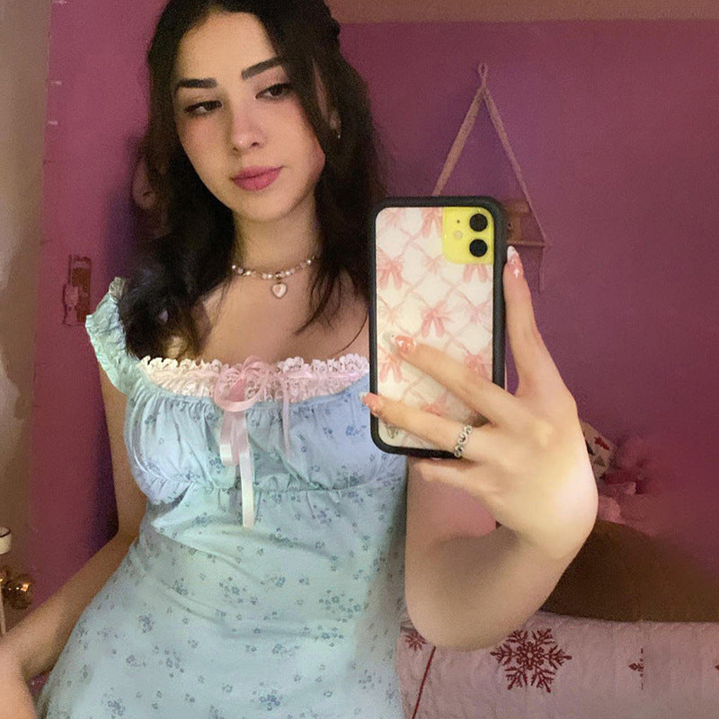 Ladies nightdress with delicate lace decoration and playful ruffle elements