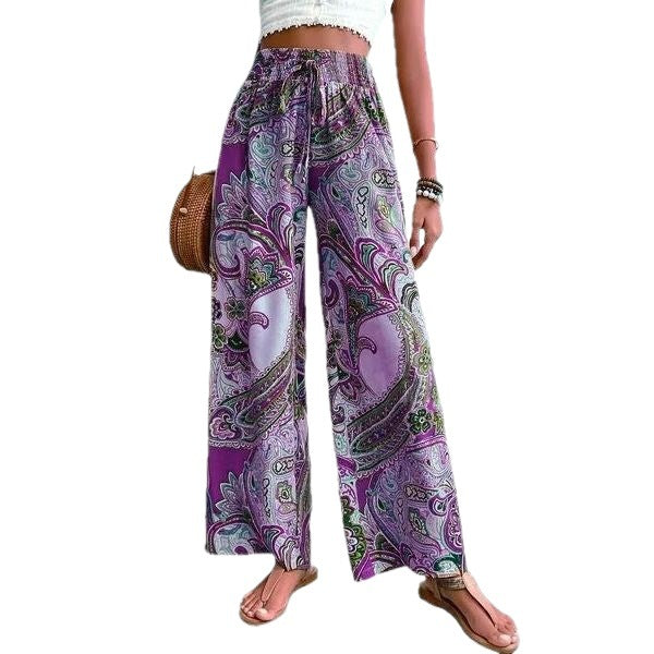 Wide Palazzo pants for women with paisley floral pattern and elastic waist Lune London