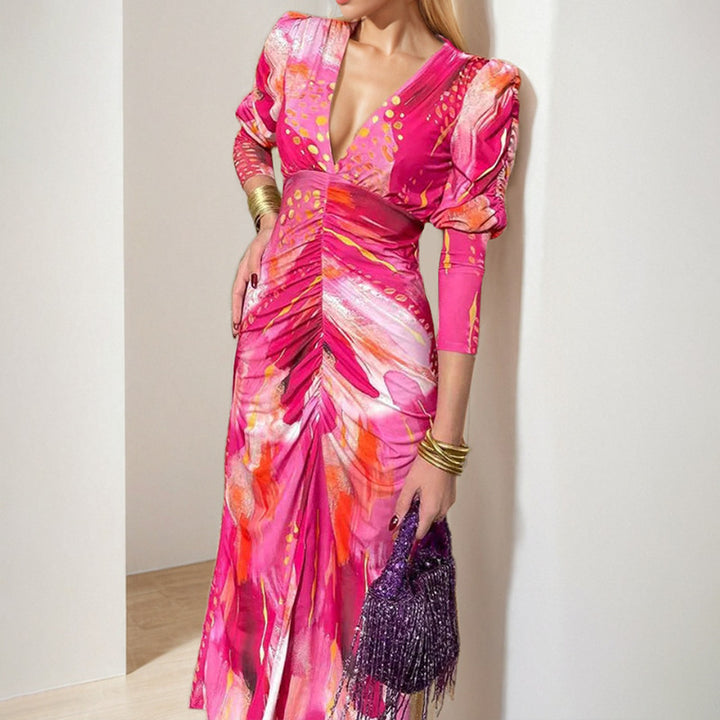 Robe maxi pour femmes avec un élégant décolleté en V et des manches bouffantes luxueuses Chic & Stil