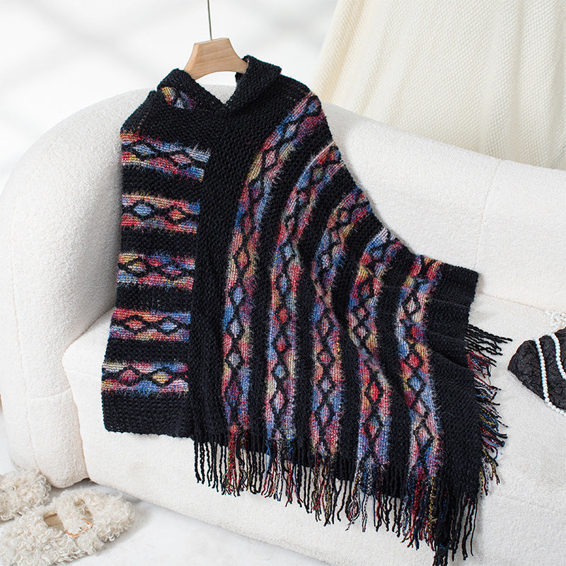 Ladies knitted poncho with hood and fringe design Lune London