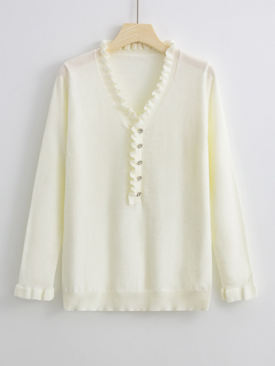 Blouse pour femmes avec un design de volants fluides et patte de boutonnage Chic & Stil