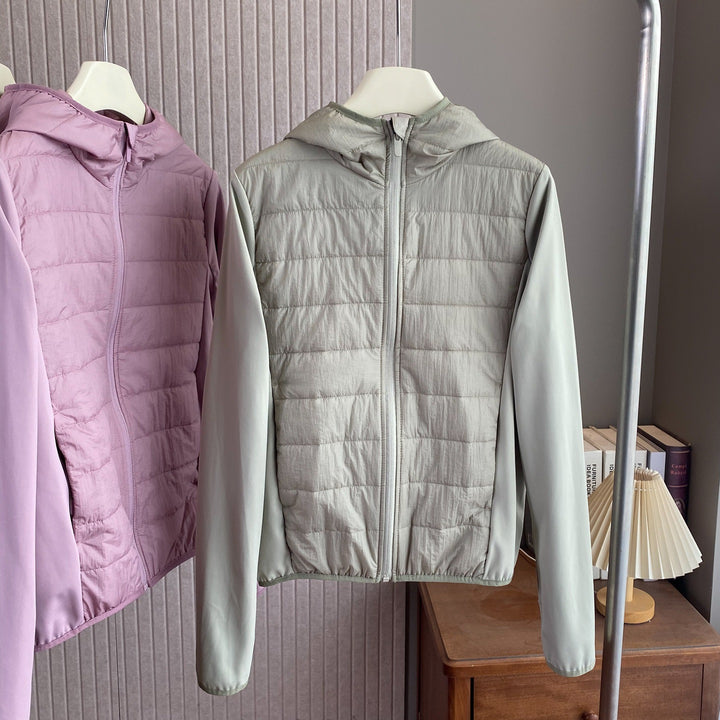 Veste hybride légère pour femmes avec capuche pratique et inserts isolants Chic & Stil