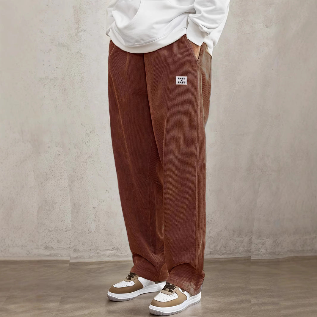 Women's wide corduroy trousers with elastic waistband and side pockets Chic & Stil