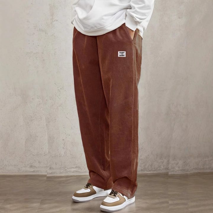 Women's wide corduroy trousers with elastic waistband and side pockets Chic & Stil