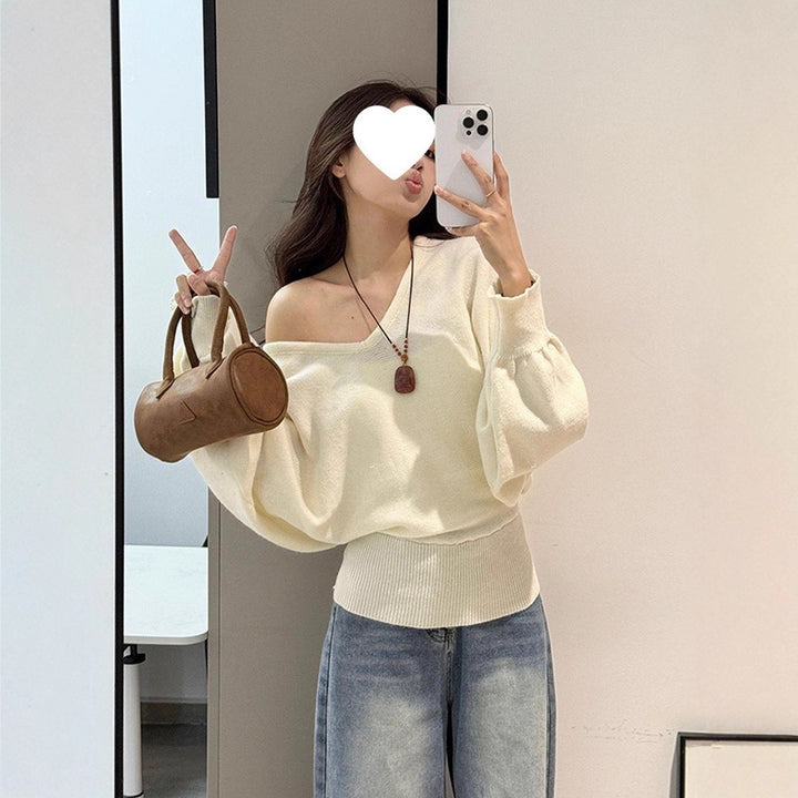 Pull moderne pour femmes avec col en V et ceinture à nouer optionnelle Chic & Stil