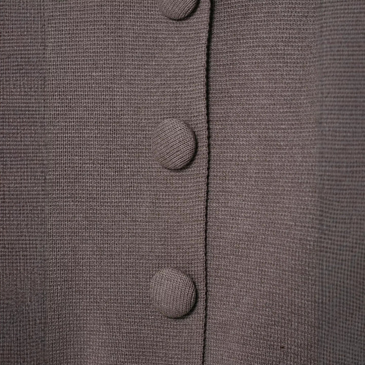 Cardigan féminin élégant avec détails de boutons Chic & Stil