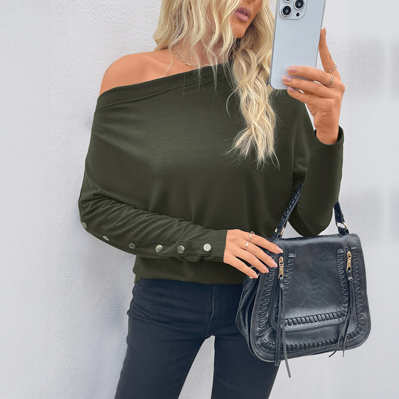 Chemise pour femmes à manches longues surdimensionnée avec encolure asymétrique et détails de boutons fins Chic & Stil