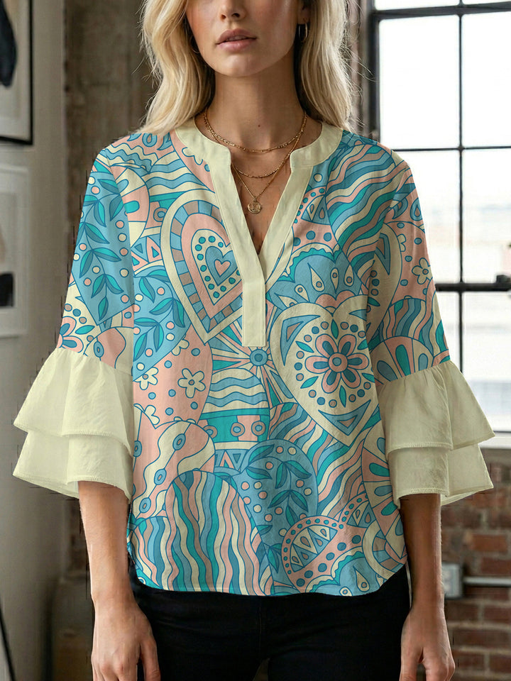Ladies elegant top with voluminous ruffle hems and floral design Lune London