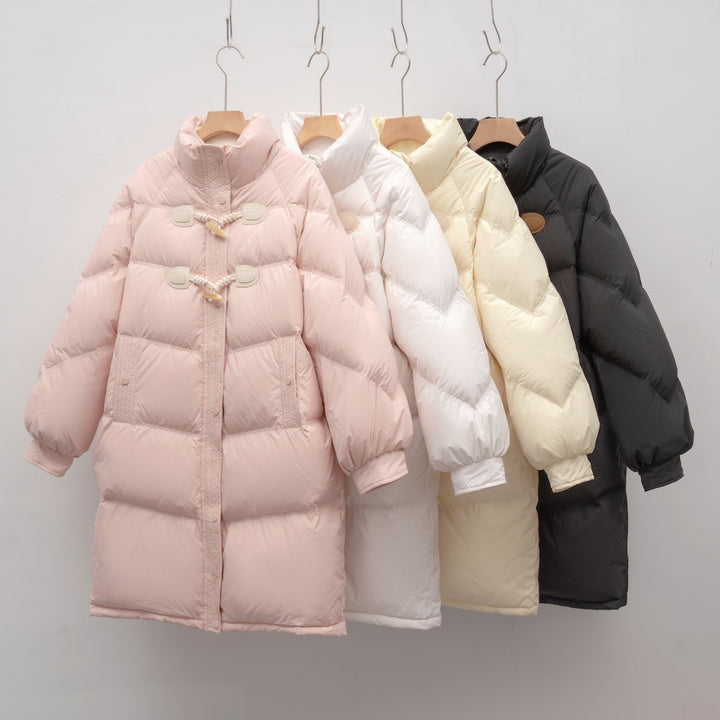 Elegant long coat for women with integrated buttons and a voluminous cut Lune London