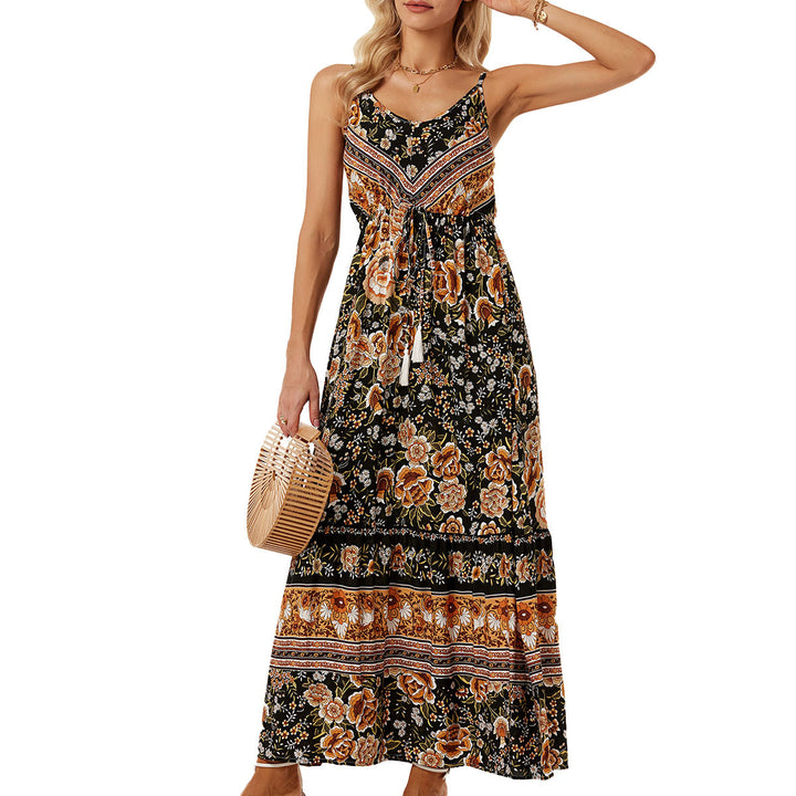 Airy maxi dress for women with a playful floral design and a drawstring at the waist Lune London