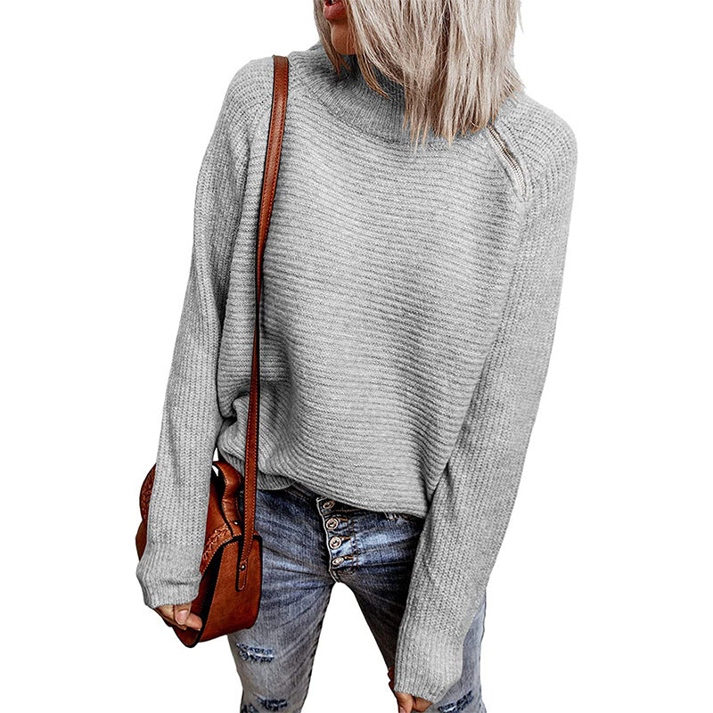 Trendy oversized women's sweater with stylish high collar and raglan sleeves Lune London