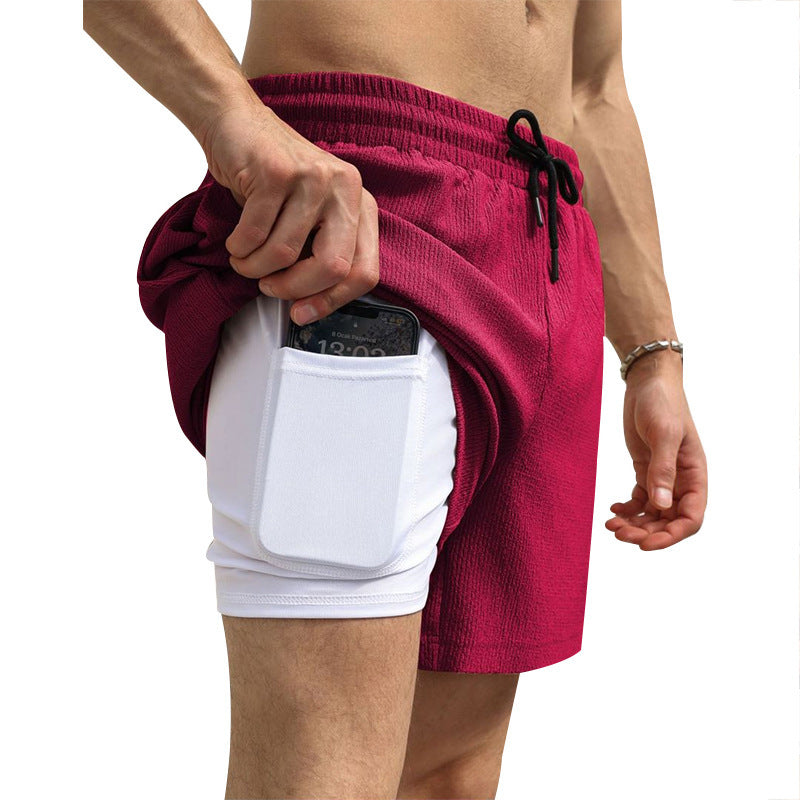 Men's sports shorts with practical pocket for smartphone Lune London
