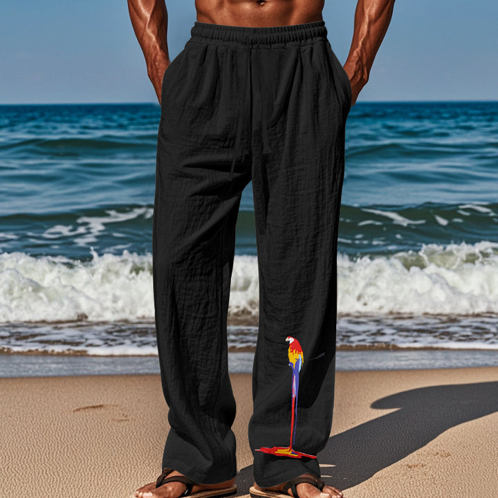 Casual beach pants for men with elastic waistband and colorful bird pattern Lune London