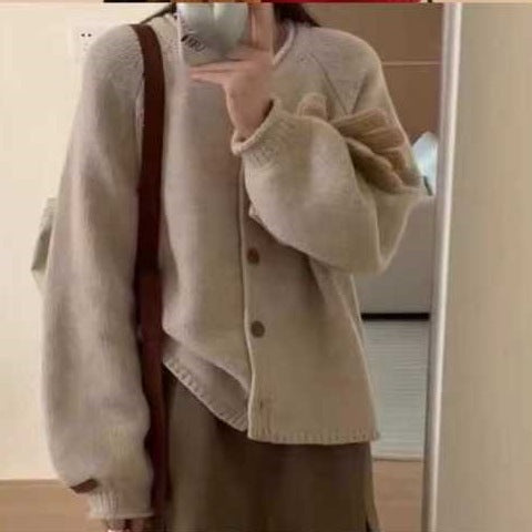 Knitted jacket for women with asymmetrical cut and generous balloon sleeves Lune London