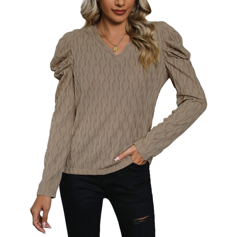 Pull pour femmes avec motif de vagues texturé et élégantes manches bouffantes Chic & Stil