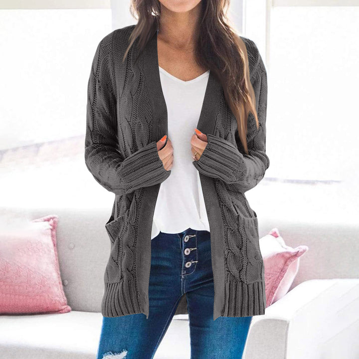 Thick knit jacket for women with modern cable patterns and practical pockets Lune London